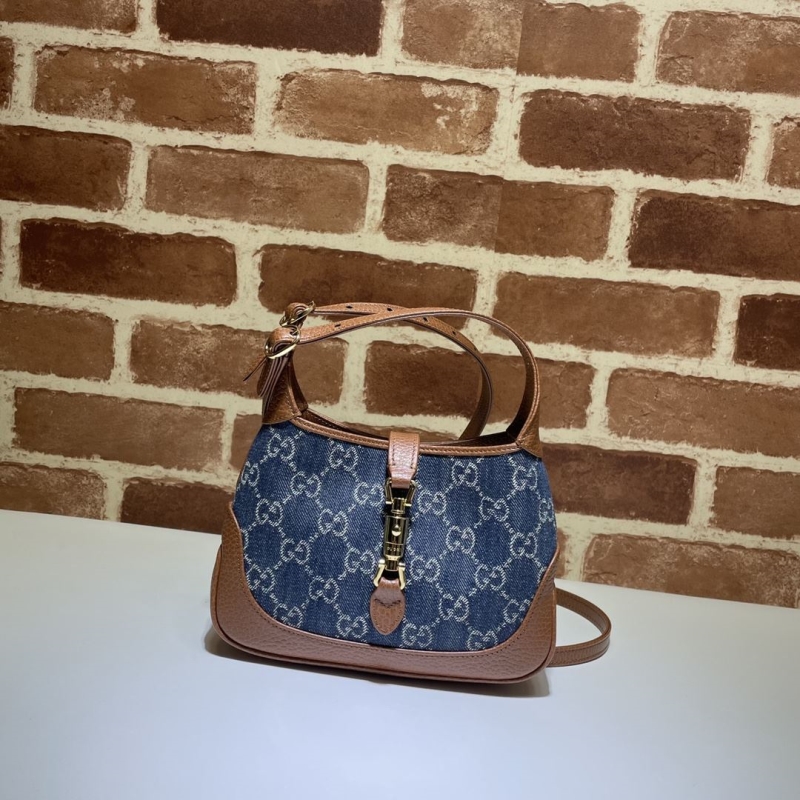 G*u*i top handle bags